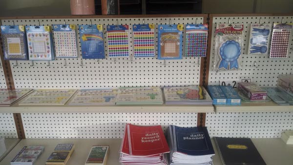 Teacher lesson planner books on counter display